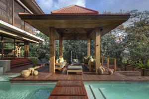 amazing-gazebo-design-with-wooden-floor-and-furniture-near-pool