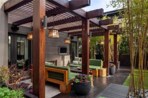 Beautiful-Terrace-With-Green-Sofa-And-Pergola-From-Wood-Plus-Classic-Pendant-Lamp