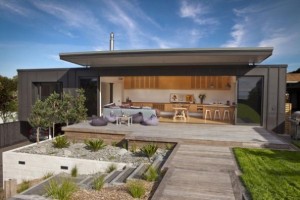 Sleek-and-Contemporary-Landscape-Garden-Idea-with-Stairs-and-Green-Lawn-to-Lead-Everybody-into-Outdoor-Kitchen-Area-as-Well-594x396
