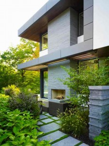 side-modern-house-design-with-small-garden-and-outdoor-fireplace-ideas