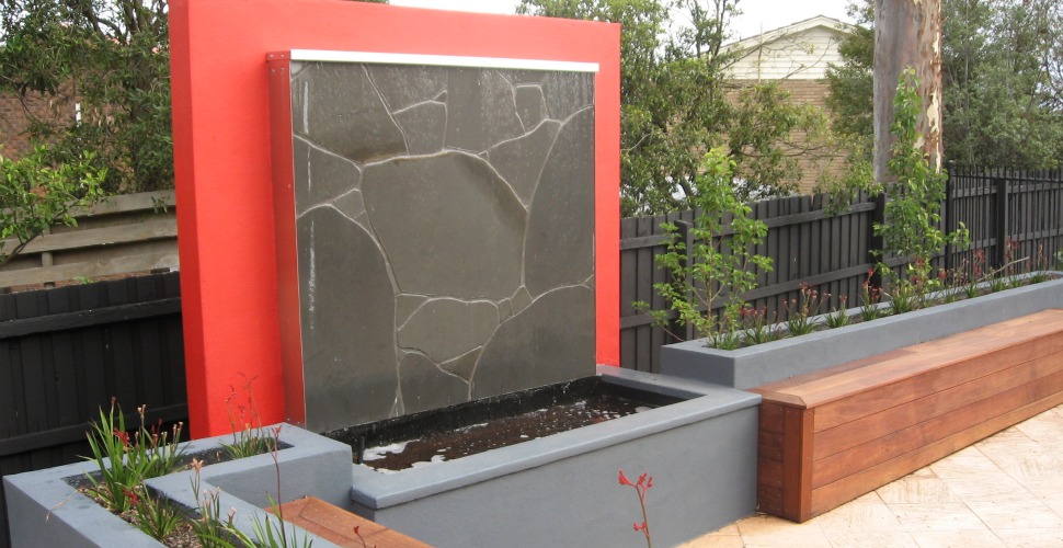 inspiring-exterior-waterwall-feature-design-squared-shape-stone-patterned-surface-red-background-color-squared-pool-forwater-falling-grey-area-for-planting-the-plant-wall-water-features-water-wall-fea
