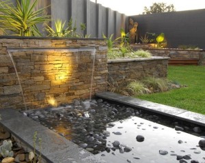 stylish-modern-garden-stone-wall-waterfall-basin-with-stones