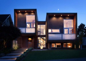 front-yard-modern-cube-house-lighting-ideas-with-wood-wall-cladding-exterior-design-plus-green-grass-garden