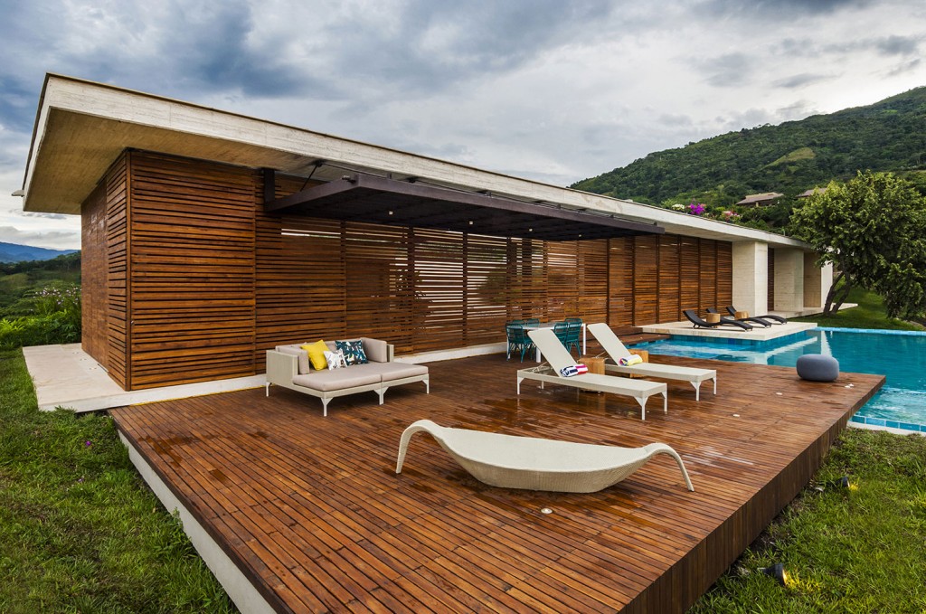 architecture-awesome-villa-design-ideas-with-charming-wood-slatted-wall-and-wooden-slutted-sun-deck-complete-with-beautiful-swimming-pool-and-outdoor-lounge-chairs-lovely-house-design-and-decor-with-w