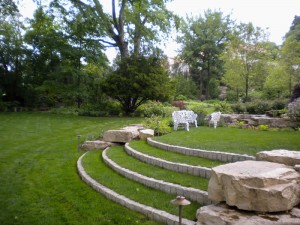 Lawn-steps-with-snapped-limestone-risers-and-ledgerock-boulder-outcroppings